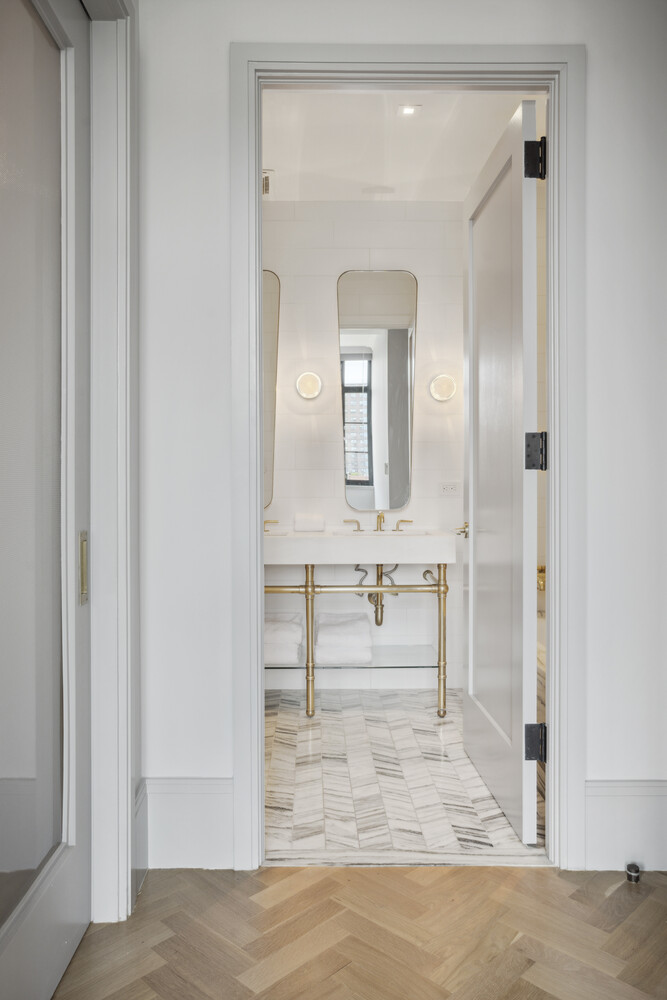 50 Clinton Street, Unit PHB Manhattan, NY 10002 - Photo 9 of 18 a view of a bathroom from the hallway
