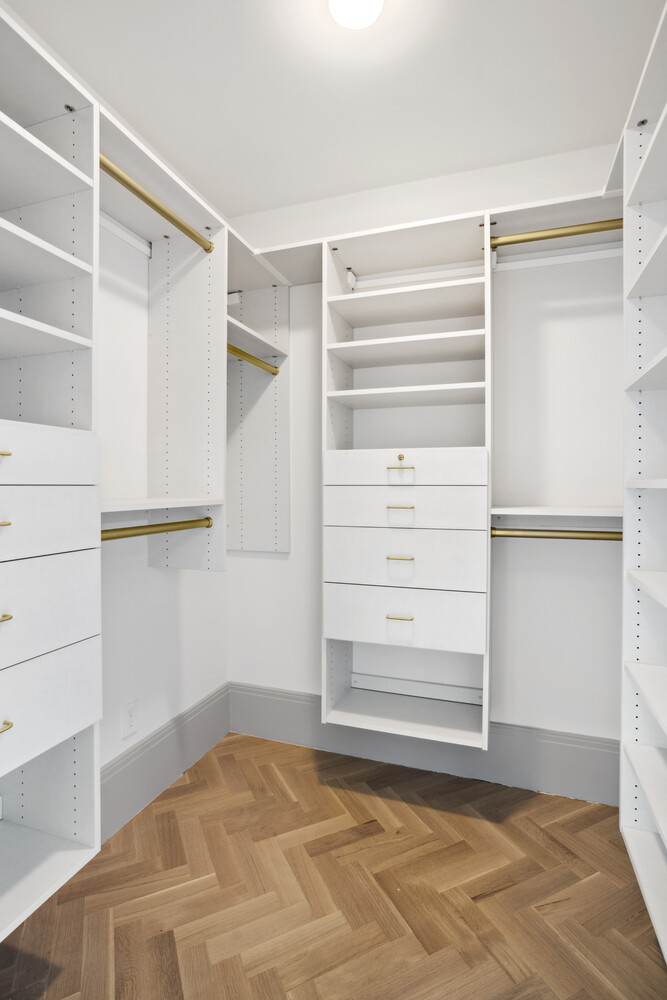 50 Clinton Street, Unit PHB Manhattan, NY 10002 - Photo 10 of 18 a view of walk in closet with empty racks