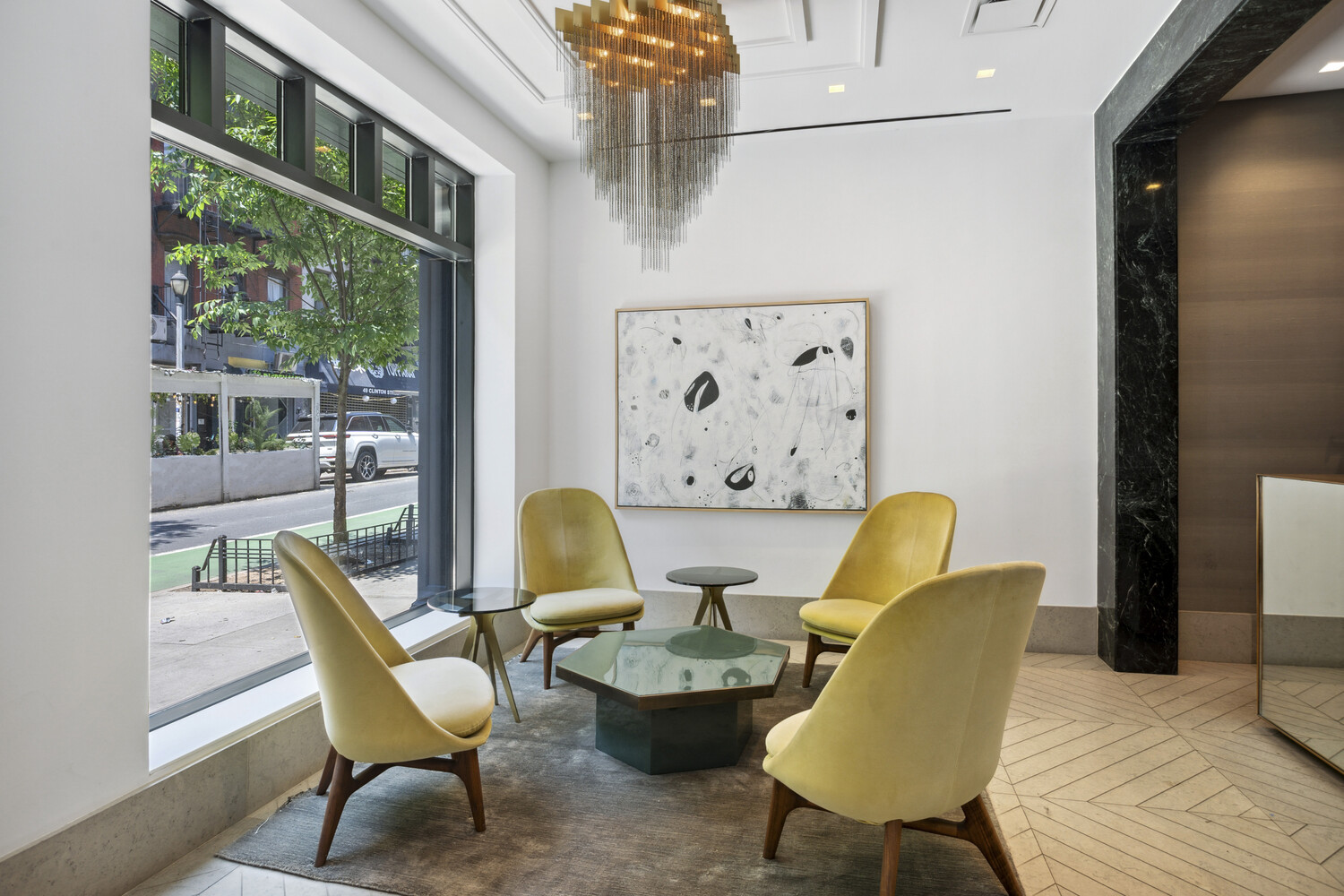 50 Clinton Street, Unit PHB Manhattan, NY 10002 - Photo 14 of 18 a living room with furniture and a large window