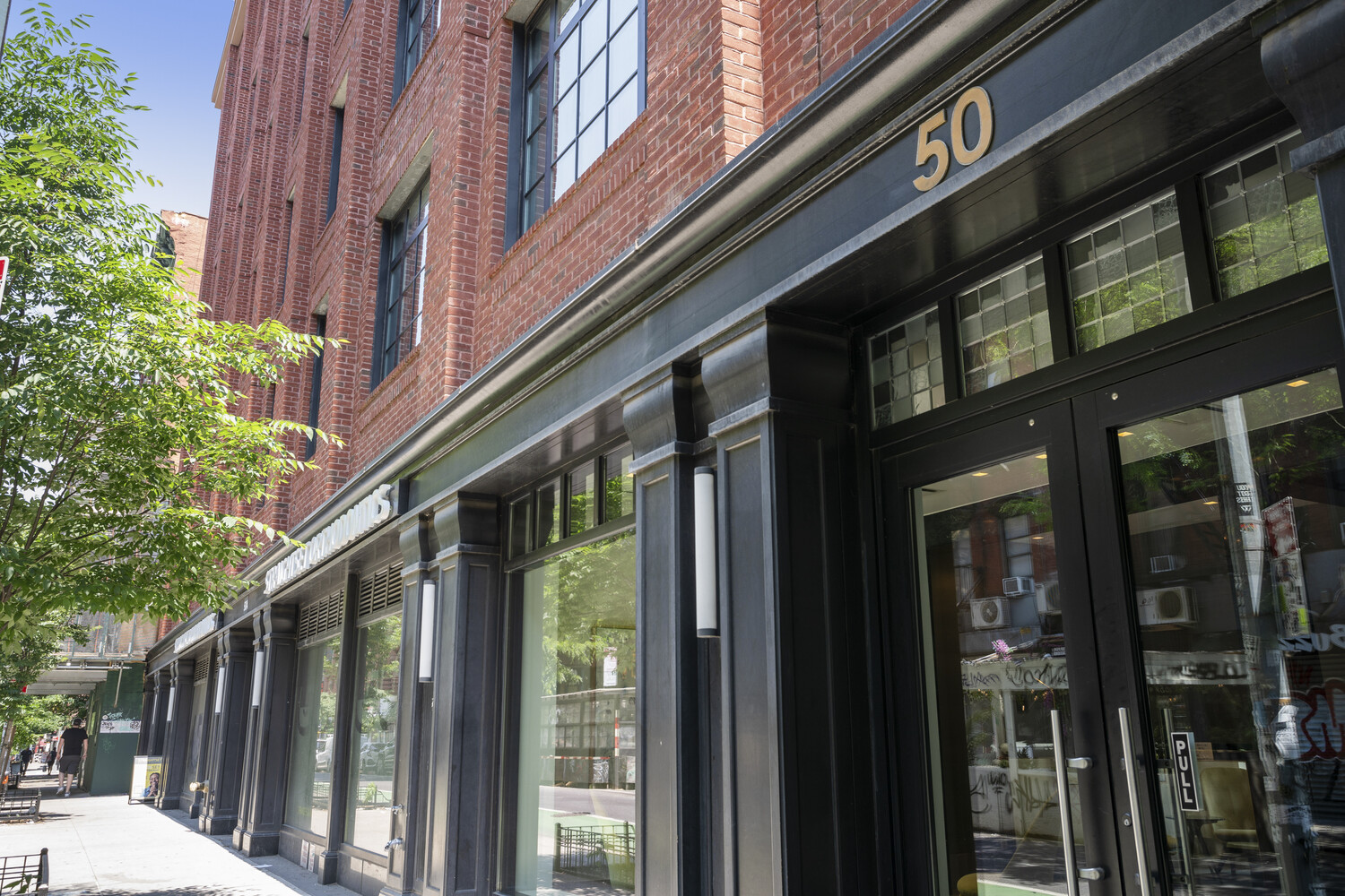 50 Clinton Street, Unit PHB Manhattan, NY 10002 - Photo 15 of 18 a view of a building on a city street