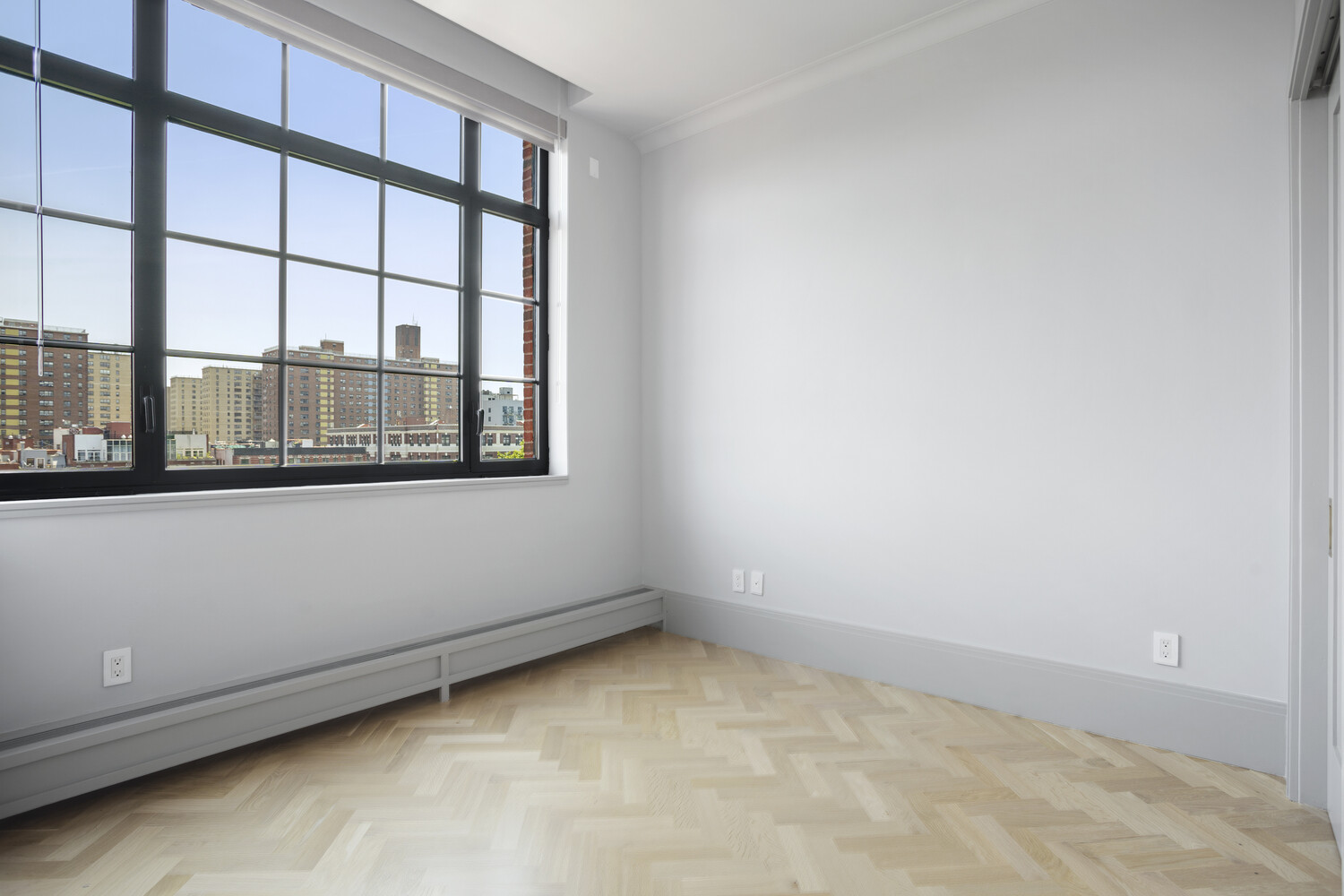 50 Clinton Street, Unit PHB Manhattan, NY 10002 - Photo 5 of 18 an empty room with a window