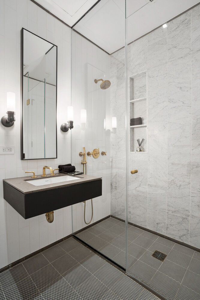 50 Clinton Street, Unit PHB Manhattan, NY 10002 - Photo 6 of 18 a bathroom with a sink and a mirror