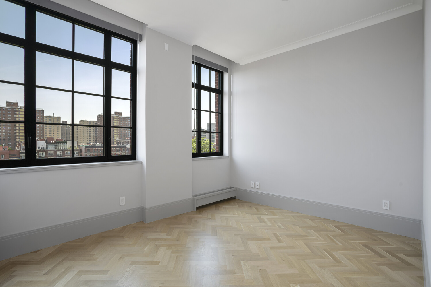 50 Clinton Street, Unit PHB Manhattan, NY 10002 - Photo 7 of 18 a view of an empty room with a window
