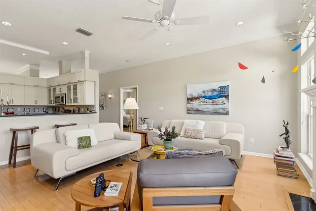 a living room with furniture and a table