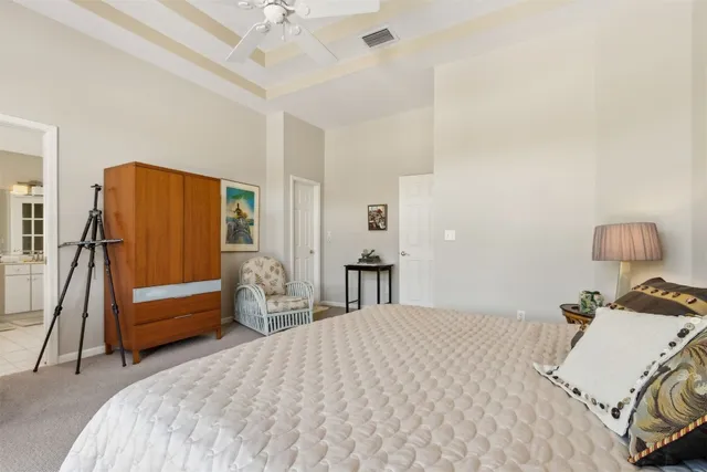 a bedroom with a bed and a walk in closet