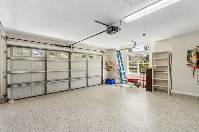 a front view of house with yard and outdoor seating