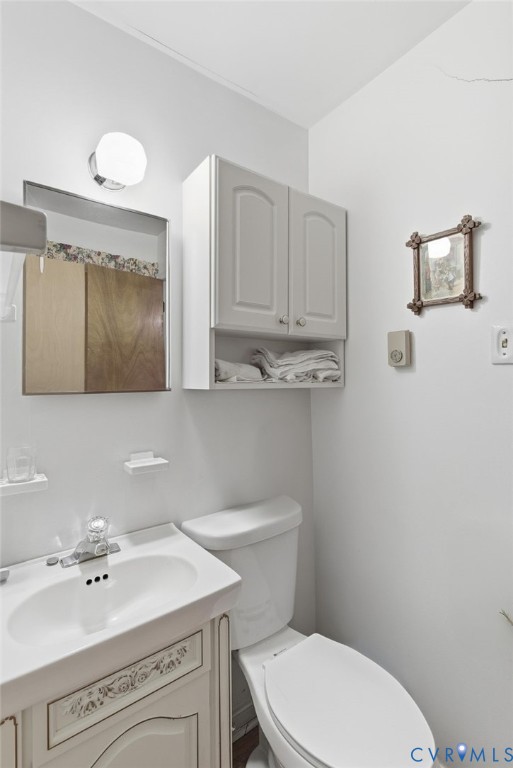 9093 Rutland Road Mechanicsville, VA 23116 - Photo 19 of 36 Bathroom featuring vanity and toilet