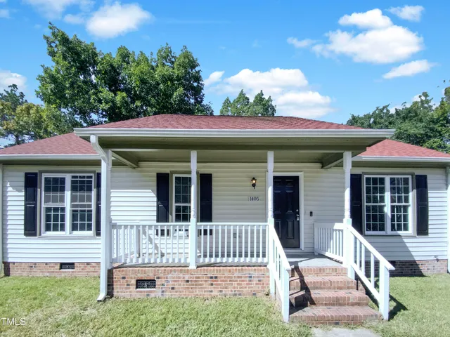 a front view of a house with a porch