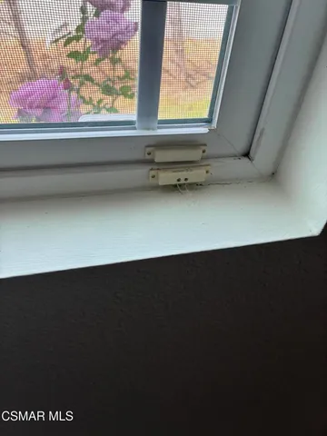 a wooden bench sitting in a room