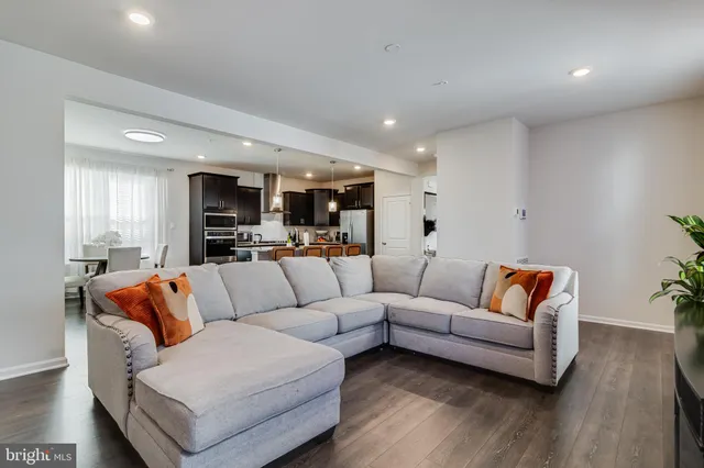 a living room with furniture and a couch