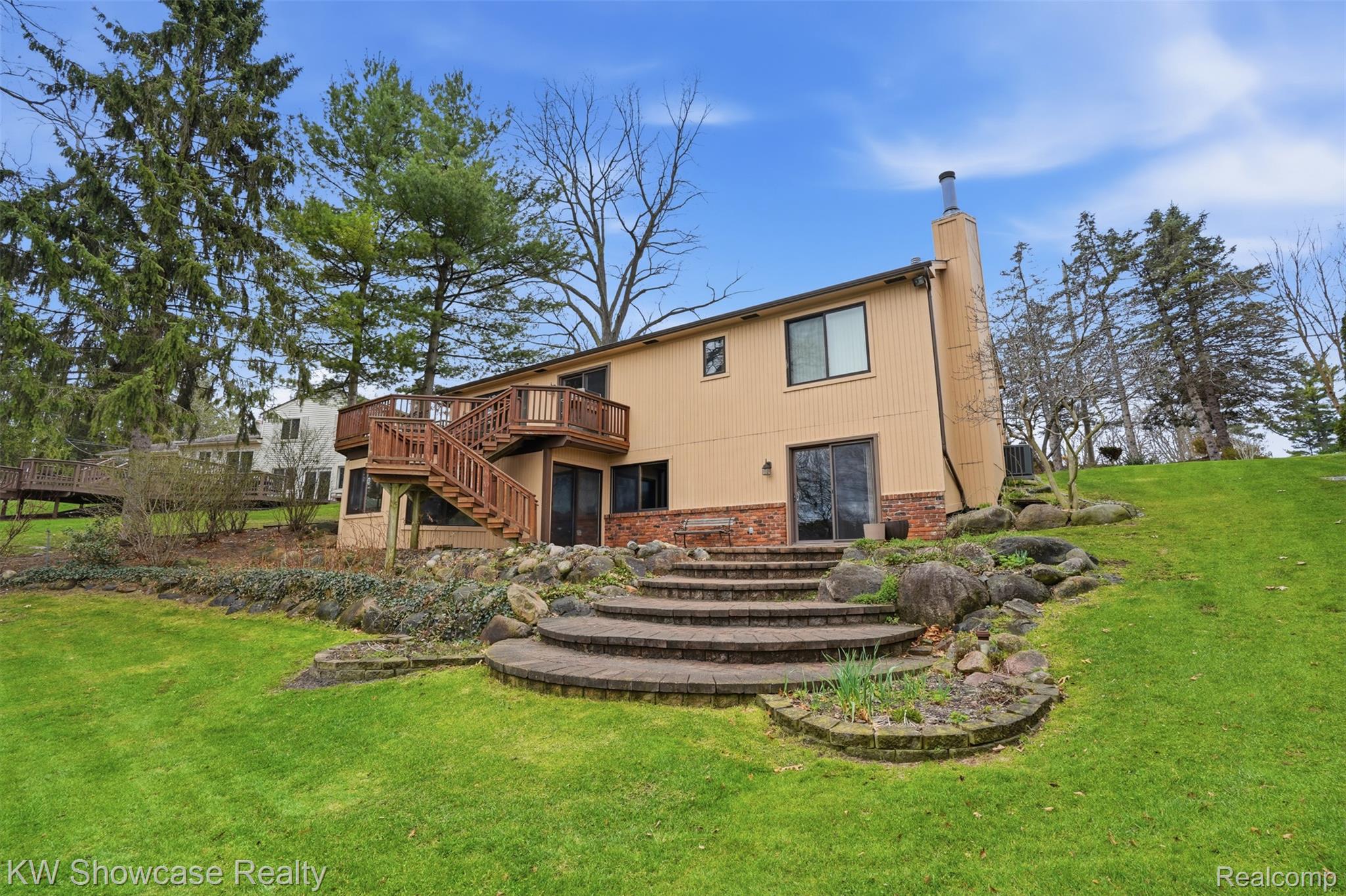 3330 Benstein Road Commerce Township, MI 48382 - Photo 24 of 40 Walkout with patio and mature gardens