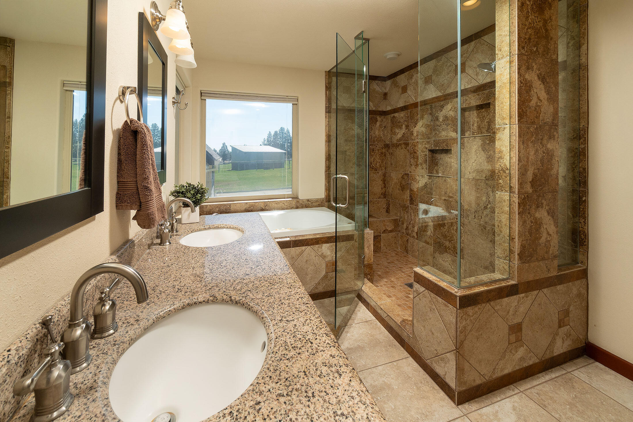 60359 Horse Butte Road Bend, OR 97702 - Photo 17 of 28 Primary bathrom with double vanity & sto
