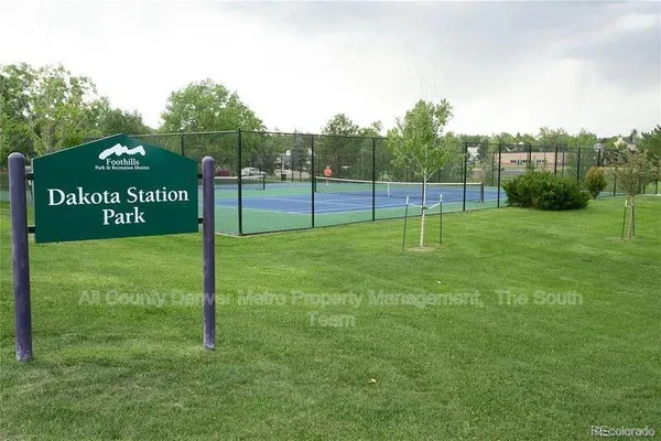 a view of a park with welcome board