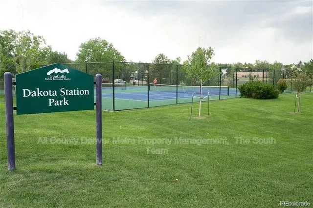 a view of a park with welcome board