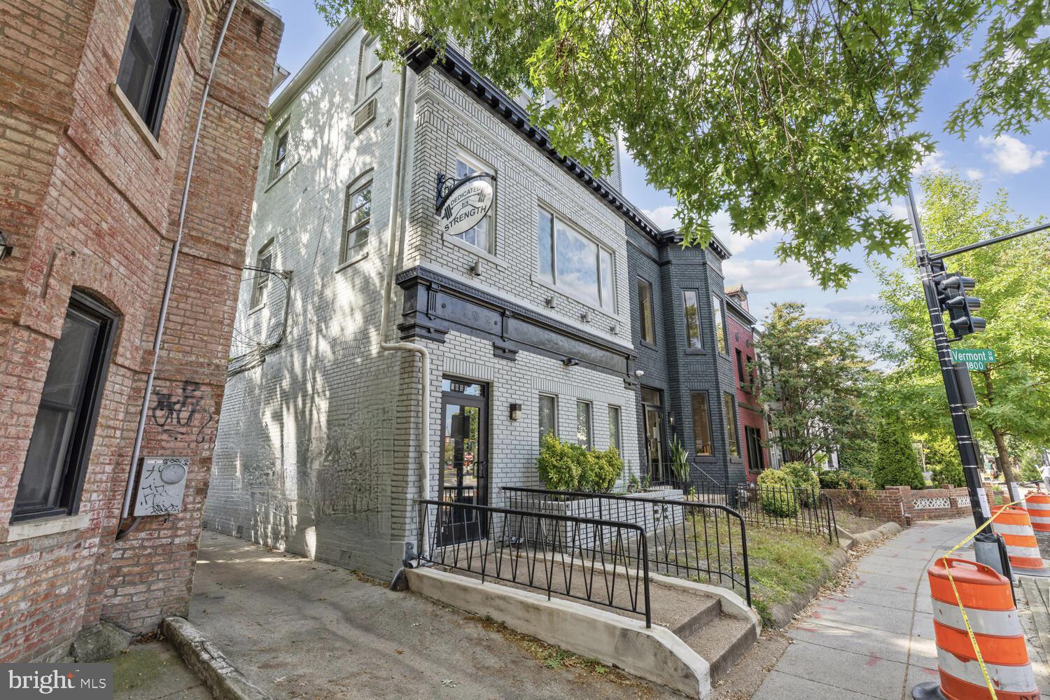 1802 11th Street Northwest, Unit 3B Washington, DC 20001 - Photo 9 of 19 a view of a street with brick walls