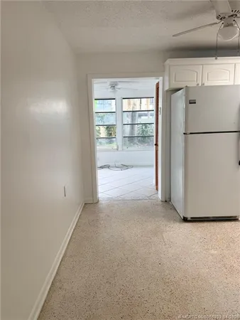 a view of empty room with front door