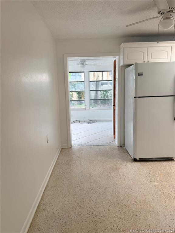 33 Southeast Sailfish Lane Stuart, FL 34996 - Photo 12 of 18 a view of empty room with front door
