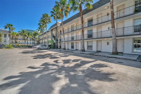 a view of a building with a street