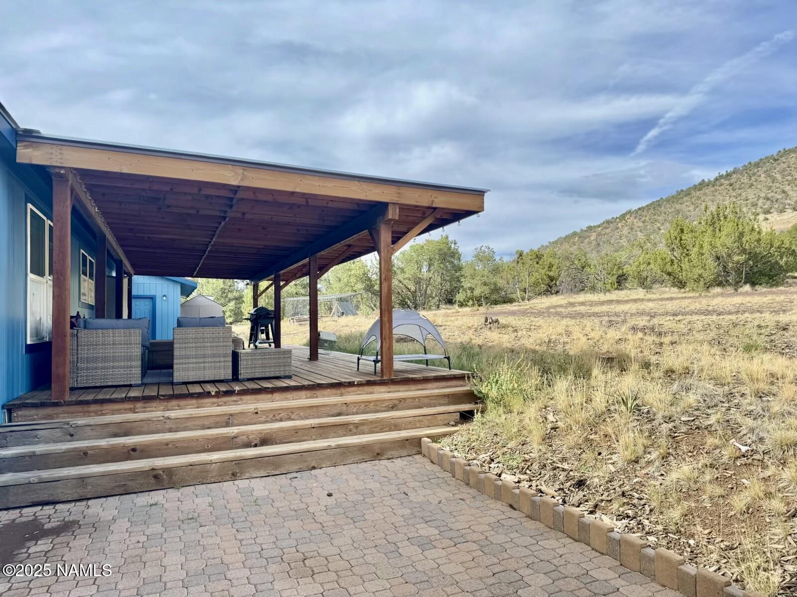6083 North Joshua Tree Road Williams, AZ 86046 - Photo 12 of 40 a view of a backyard of the house