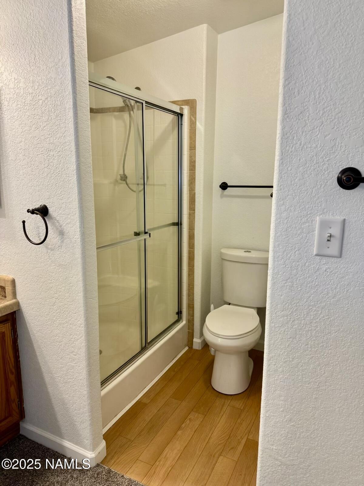 6083 North Joshua Tree Road Williams, AZ 86046 - Photo 14 of 40 a bathroom with a toilet and a shower