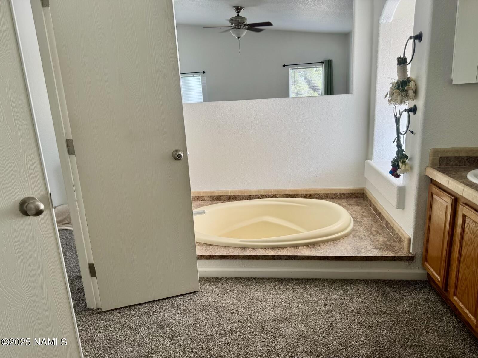 6083 North Joshua Tree Road Williams, AZ 86046 - Photo 18 of 40 wooden floor in a bathroom