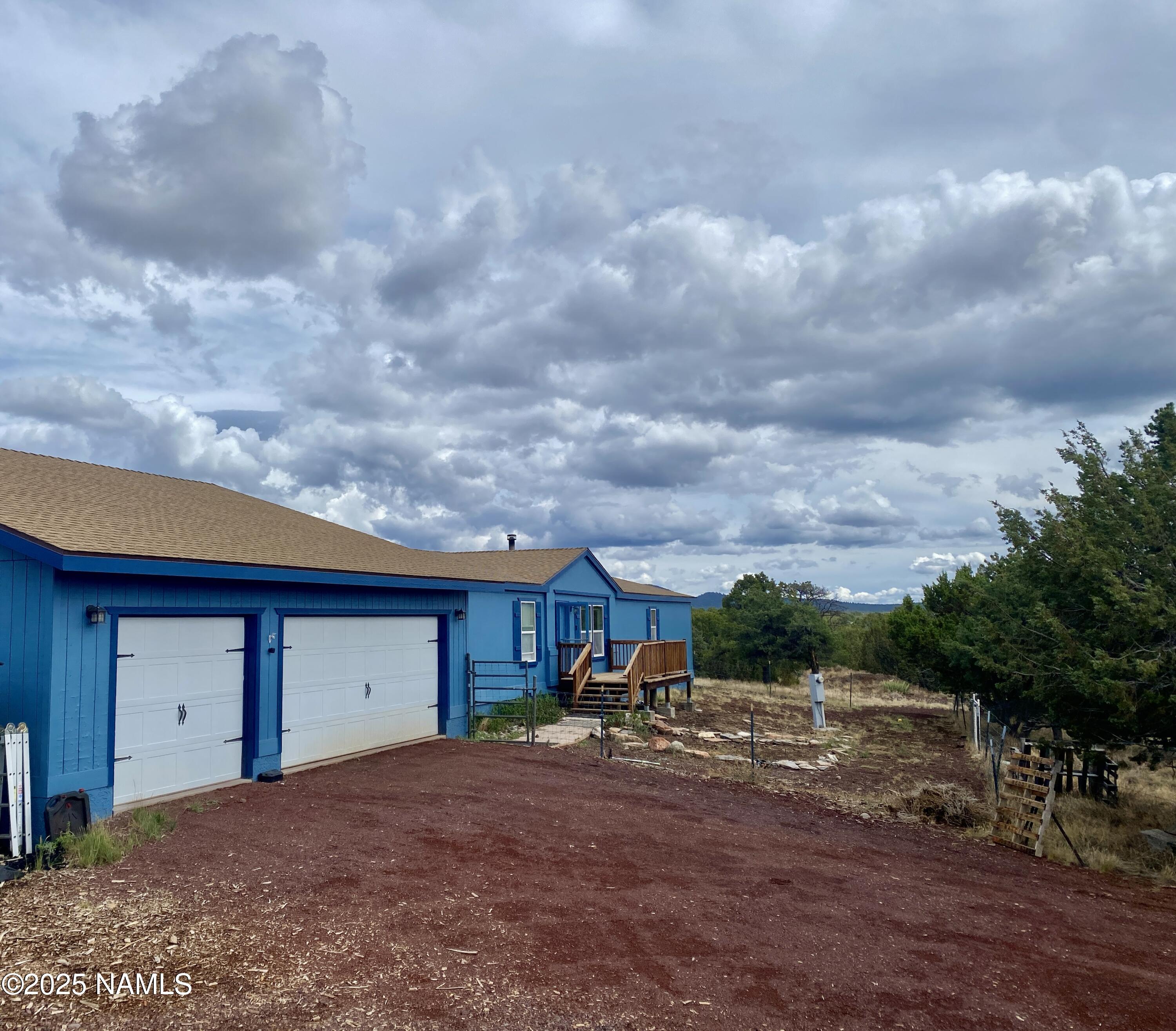 6083 North Joshua Tree Road Williams, AZ 86046 - Photo 31 of 40 a view of backyard of house
