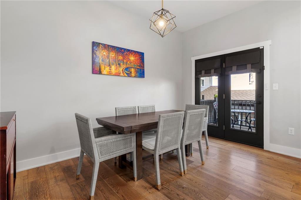 734 Middle Street Pittsburgh, PA 15212 - Photo 17 of 46 a view of a dining room with furniture window and wooden floor
