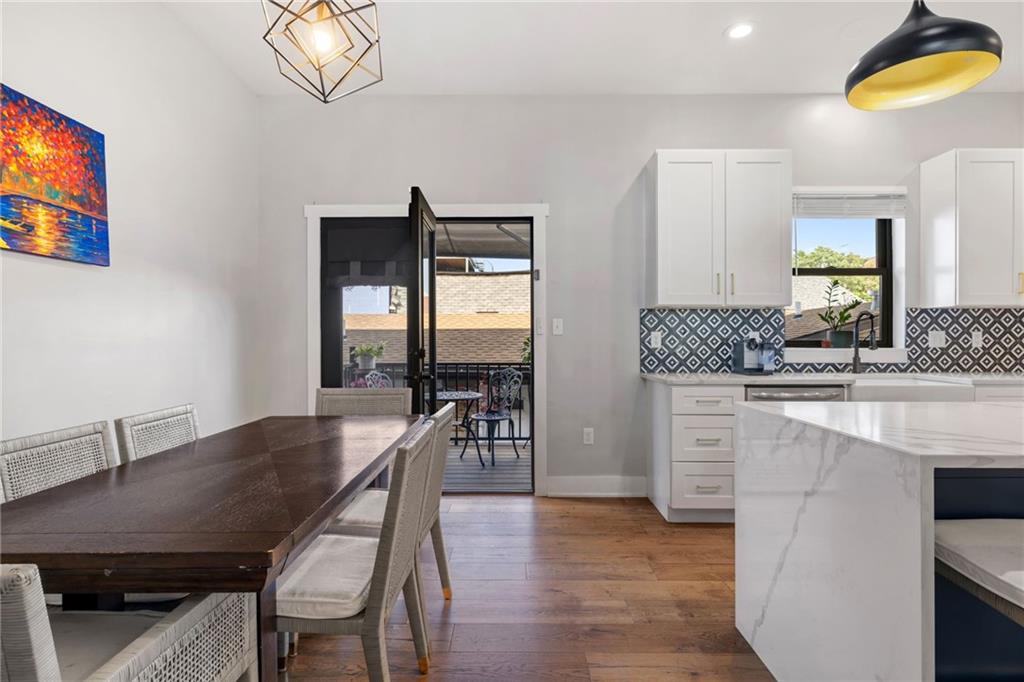 734 Middle Street Pittsburgh, PA 15212 - Photo 18 of 46 a dining room with furniture and wooden floor