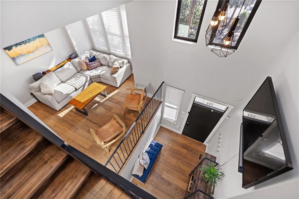 734 Middle Street Pittsburgh, PA 15212 - Photo 22 of 46 a view of living room with furniture and a painting on the wall