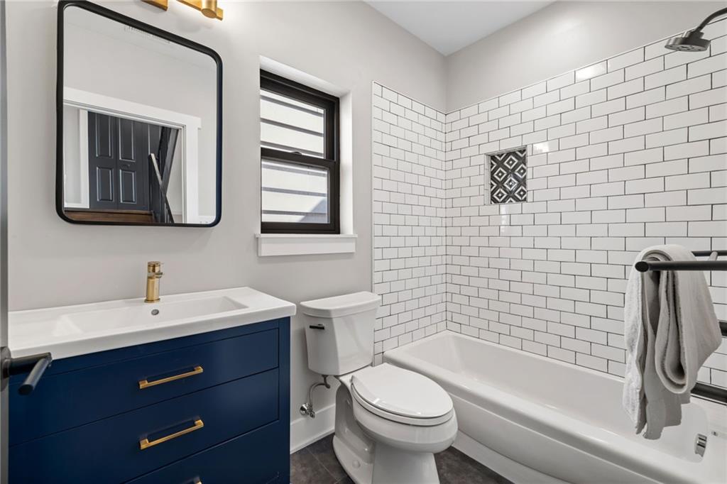 734 Middle Street Pittsburgh, PA 15212 - Photo 26 of 46 a bathroom with a sink toilet and shower