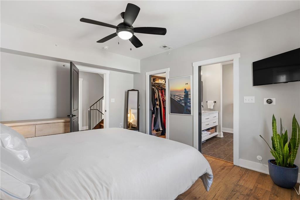 734 Middle Street Pittsburgh, PA 15212 - Photo 29 of 46 a bedroom with a bed and a flat screen tv