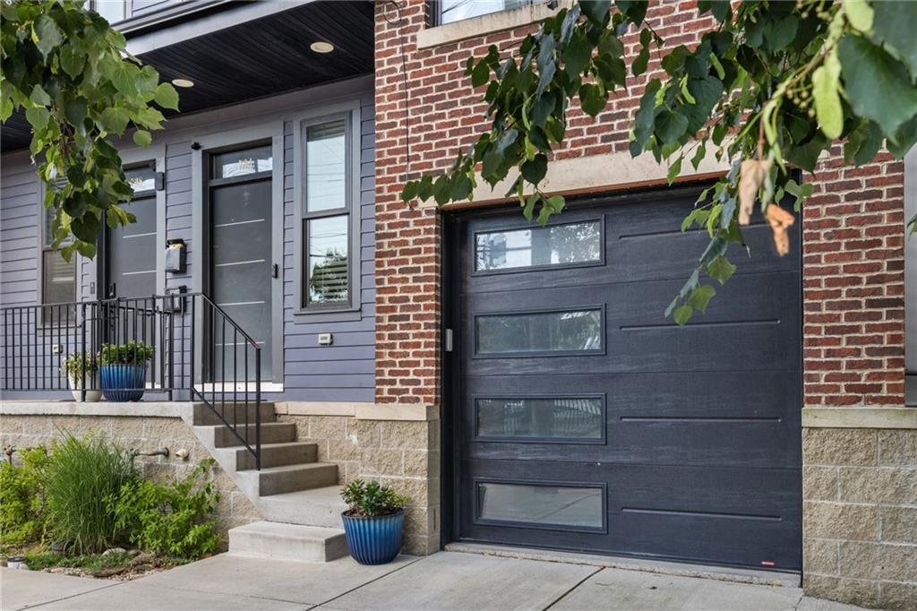 734 Middle Street Pittsburgh, PA 15212 - Photo 3 of 46 a front view of a house with a garden