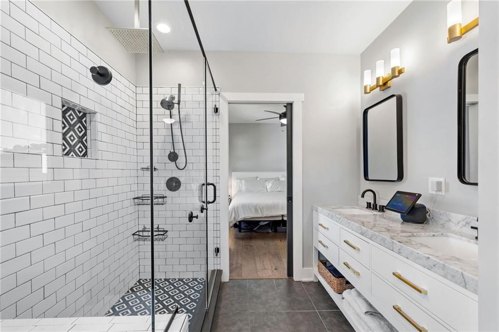 734 Middle Street Pittsburgh, PA 15212 - Photo 31 of 46 a bathroom with a double vanity sink mirror and shower