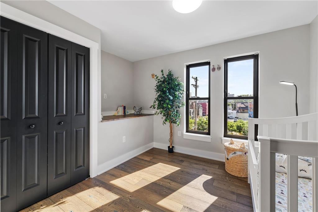 734 Middle Street Pittsburgh, PA 15212 - Photo 34 of 46 a room with a window and a potted plant