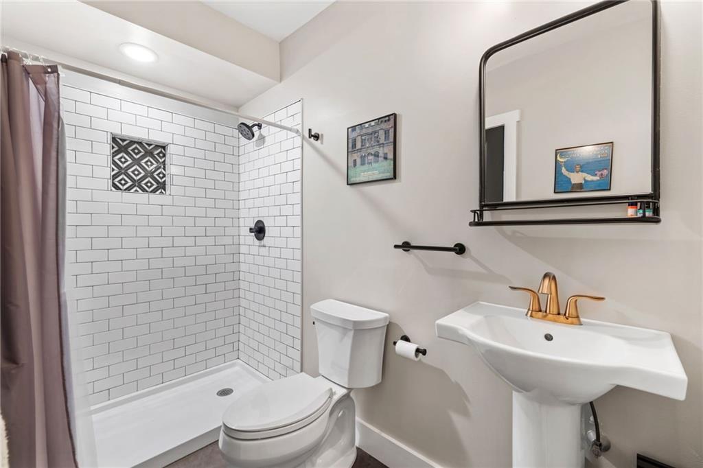 734 Middle Street Pittsburgh, PA 15212 - Photo 38 of 46 a bathroom with a sink toilet and shower