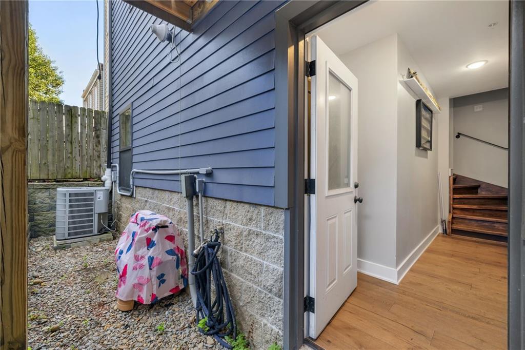 734 Middle Street Pittsburgh, PA 15212 - Photo 39 of 46 a bedroom with a bed and a window