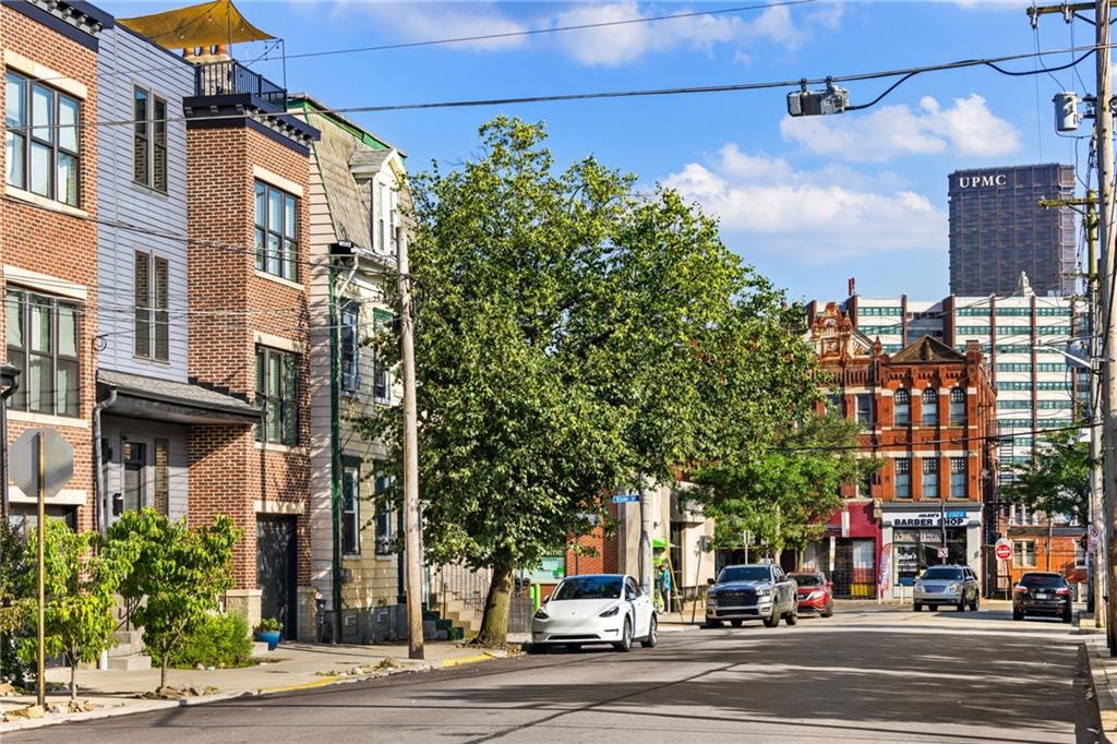 734 Middle Street Pittsburgh, PA 15212 - Photo 44 of 46 a view of a city street lined with buildings and trees