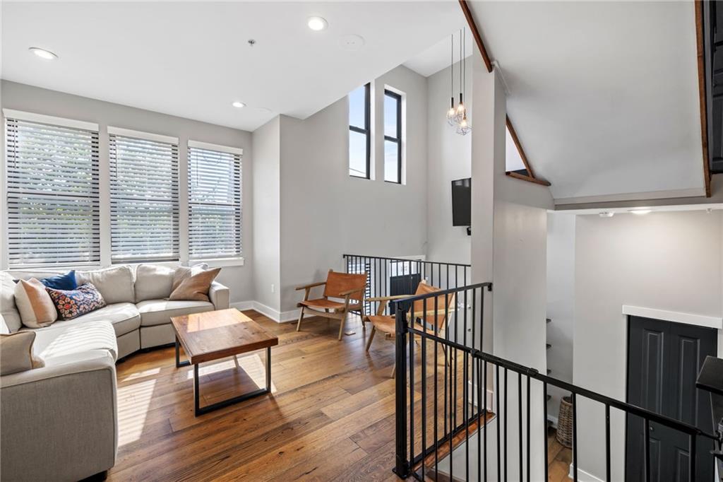 734 Middle Street Pittsburgh, PA 15212 - Photo 5 of 46 a living room with furniture wooden floor and a large window