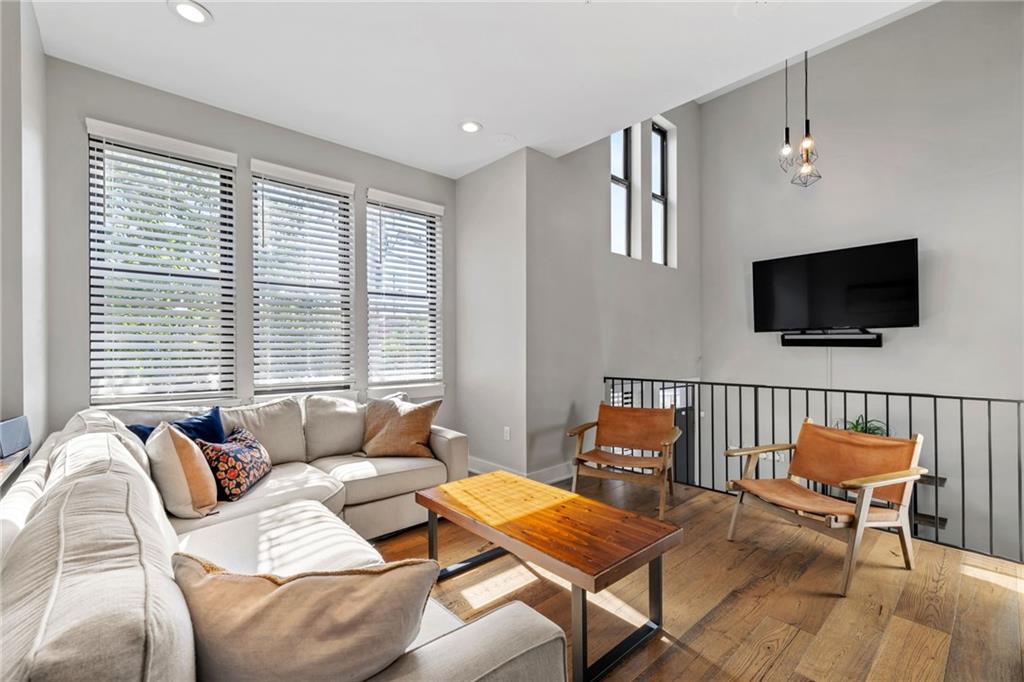 734 Middle Street Pittsburgh, PA 15212 - Photo 7 of 46 a bedroom with furniture and a flat screen tv