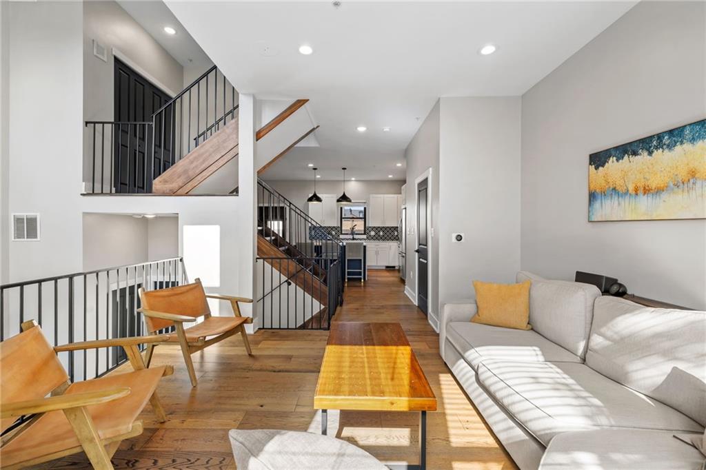 734 Middle Street Pittsburgh, PA 15212 - Photo 8 of 46 a living room with furniture and wooden floor