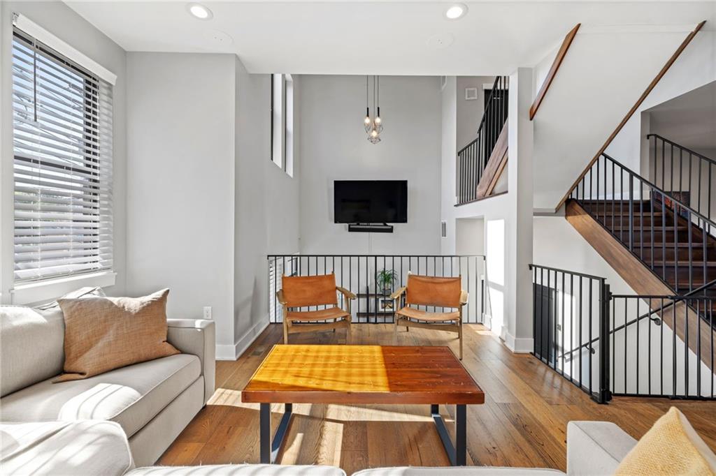 734 Middle Street Pittsburgh, PA 15212 - Photo 9 of 46 a living room with furniture fireplace and a flat screen tv