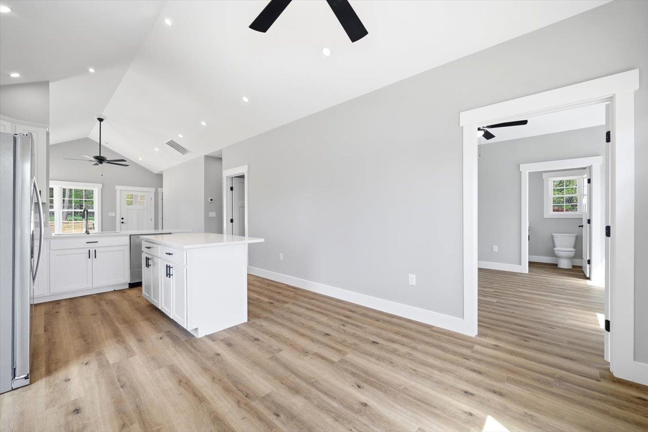 103 Hilltop Terrace Road Staunton, VA 24401 - Photo 15 of 47 a kitchen with white cabinets and wooden floor
