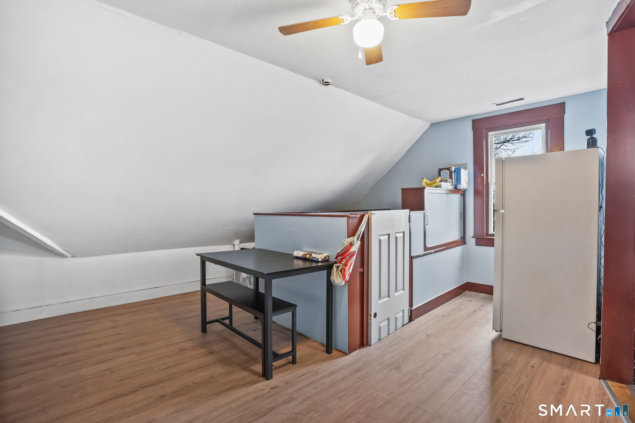 36 Maltby Place New Haven, CT 06513 - Photo 12 of 38 a view of a workspace with furniture and wooden floor