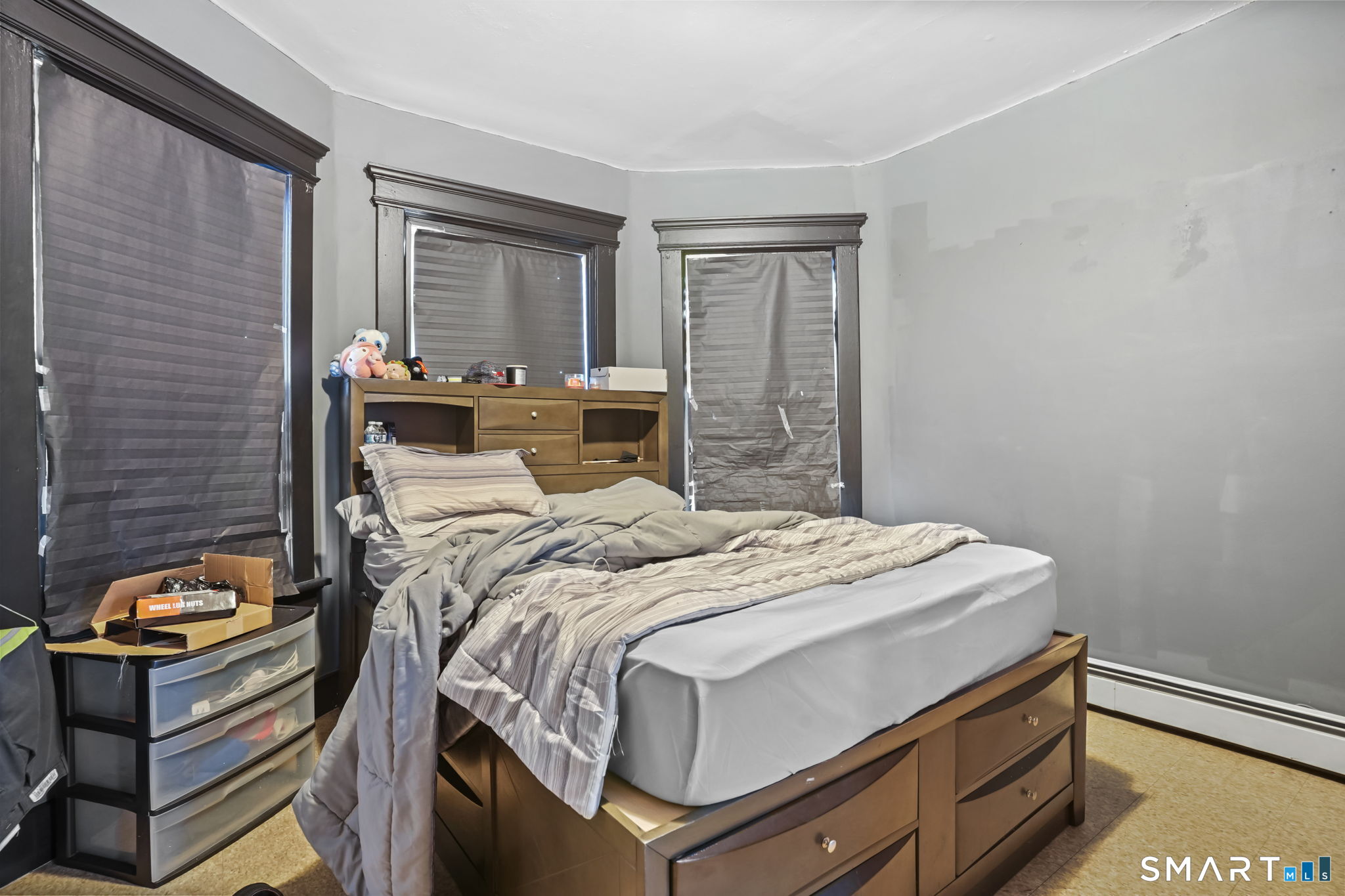 36 Maltby Place New Haven, CT 06513 - Photo 31 of 38 a bed sitting in a bedroom next to a window