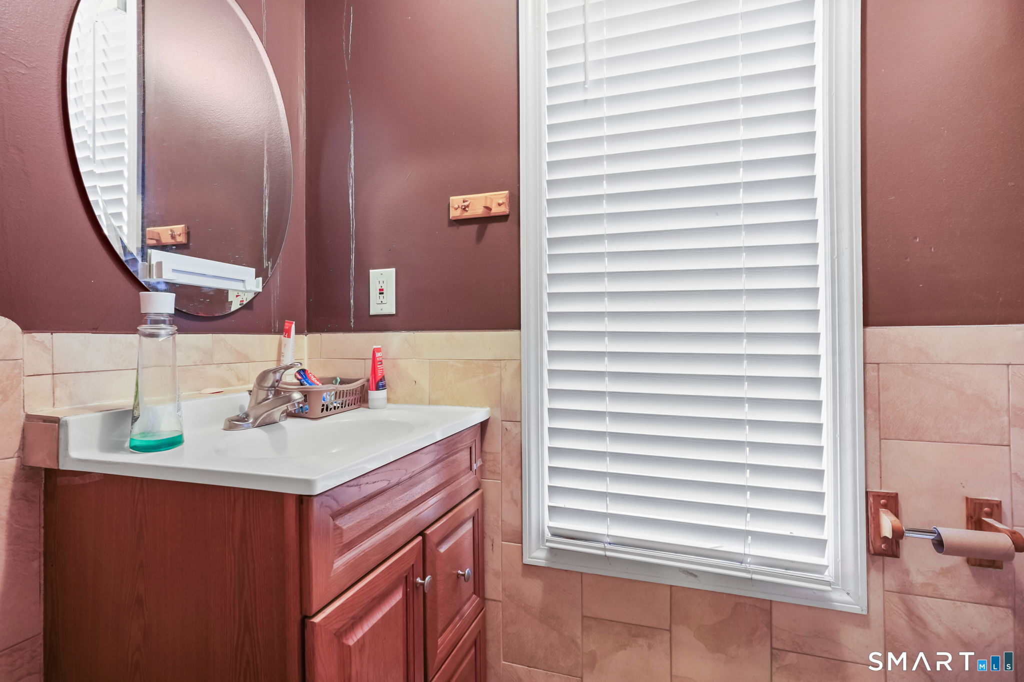 36 Maltby Place New Haven, CT 06513 - Photo 32 of 38 a bathroom with a sink and a mirror
