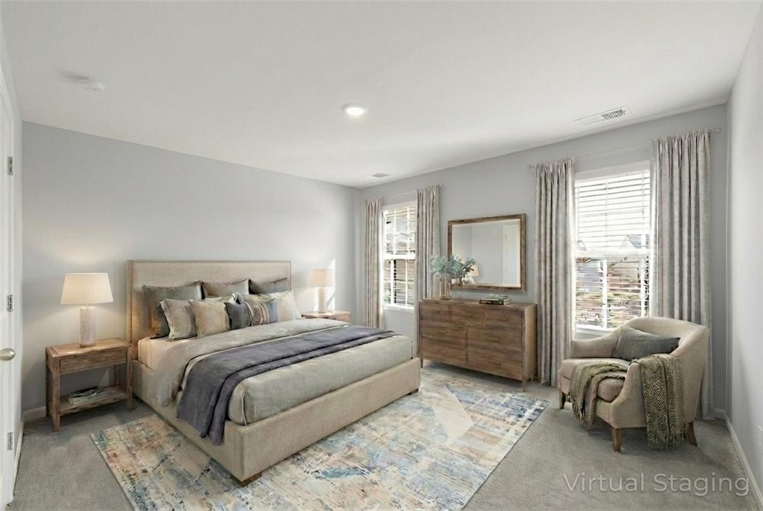 515 Brasstown Court Pendleton, SC 29670 - Photo 9 of 25 This virtually staged primary bedroom suite features abundant natural light and ample space for relaxation.