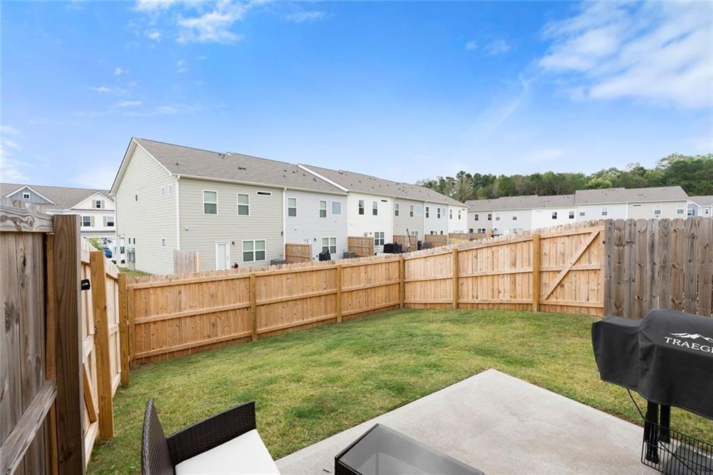 254 Pinnacle Way Jasper, GA 30143 - Photo 11 of 33 a view of a backyard with sitting area