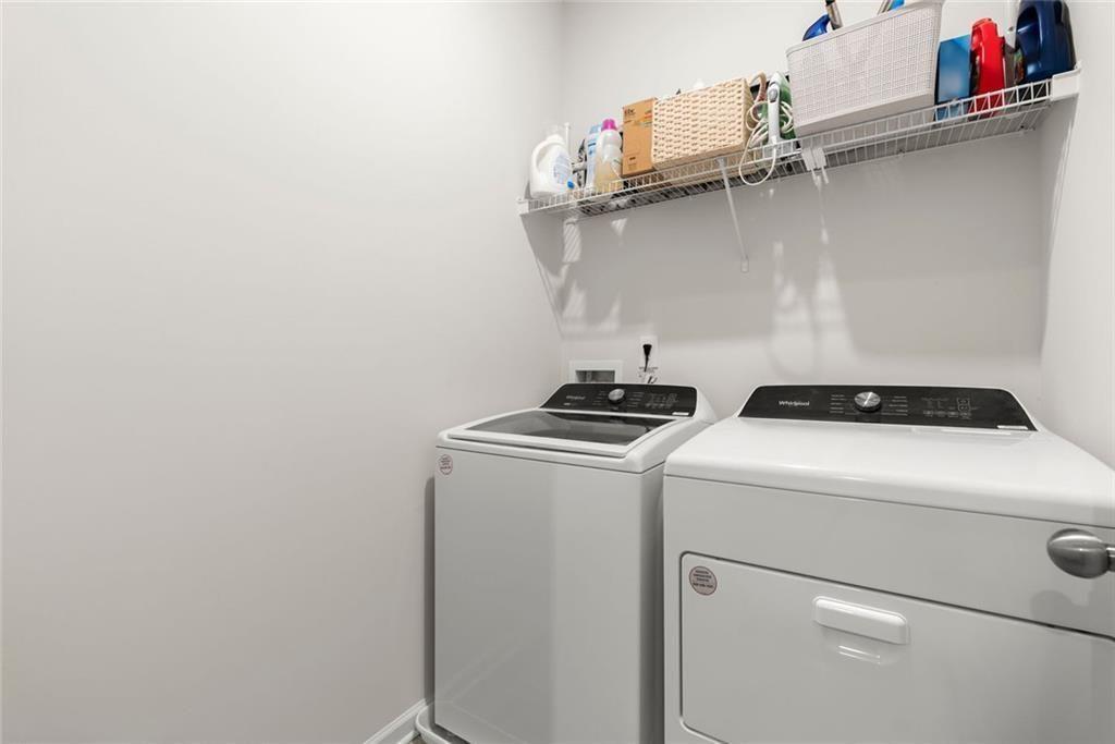 254 Pinnacle Way Jasper, GA 30143 - Photo 32 of 33 a utility room with dryer and washer