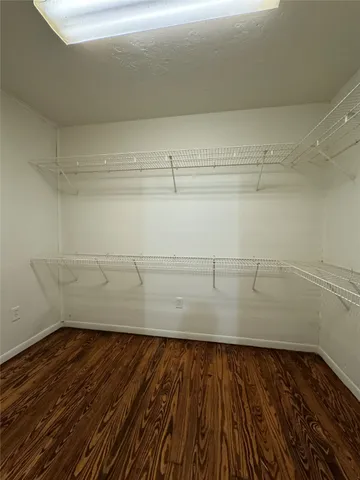 a view of a room with racks on the wall