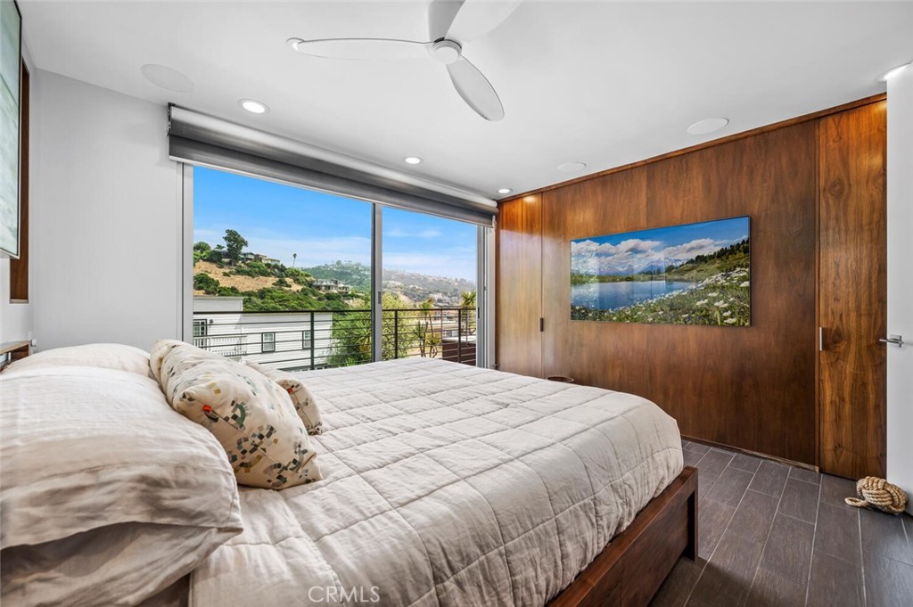 1340 Cerritos Drive Laguna Beach, CA 92651 - Photo 17 of 46 a bed sitting in a bedroom next to a window